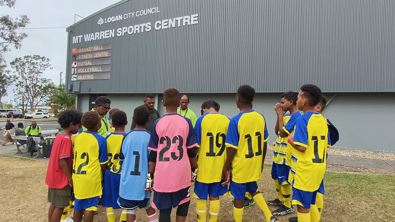 The team gathered outside Mt Warren Sports Centre